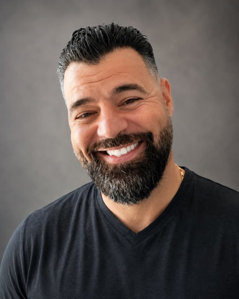 My Own Rentals founder smiling in a black shirt